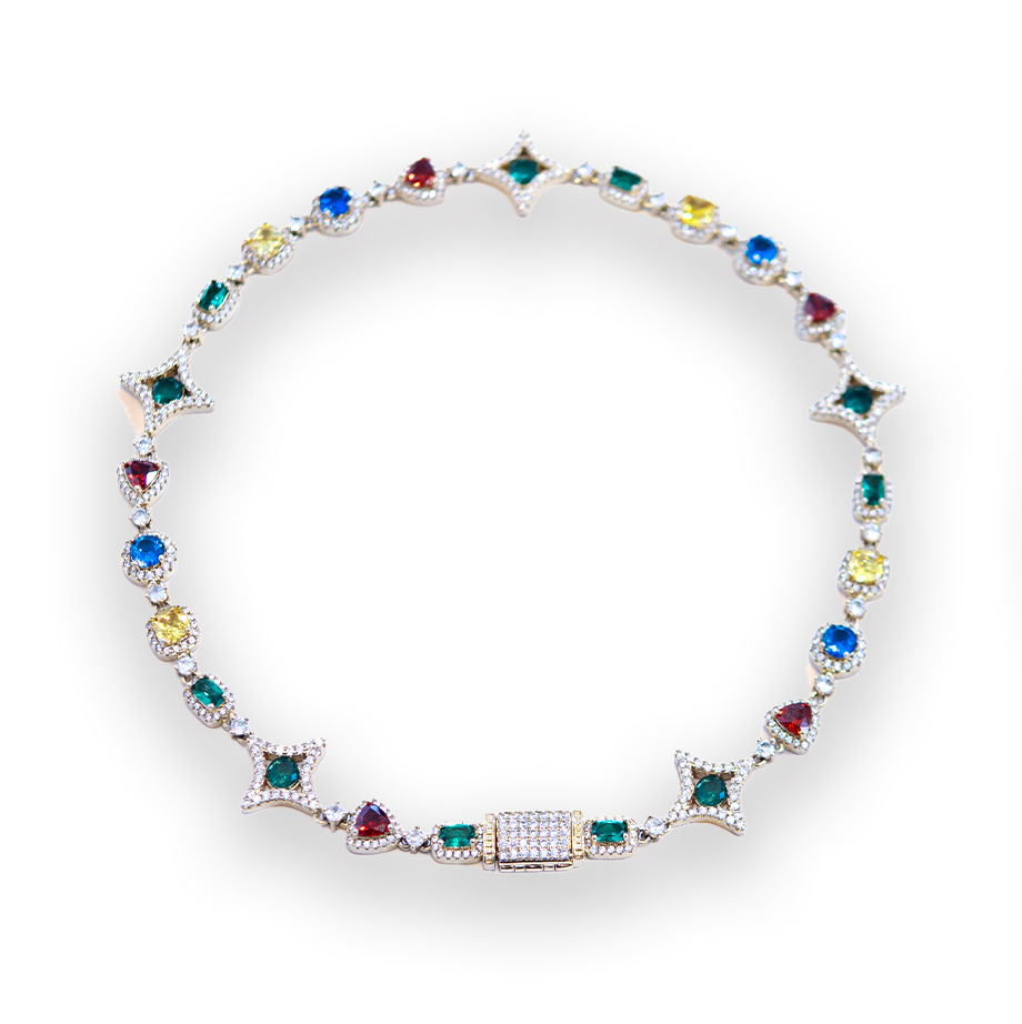 Four colorful stretch bracelets arranged in a 2x2 grid on a white background. Each bracelet features a star-shaped link design with small multicolored gemstones and a larger central rectangular stone.